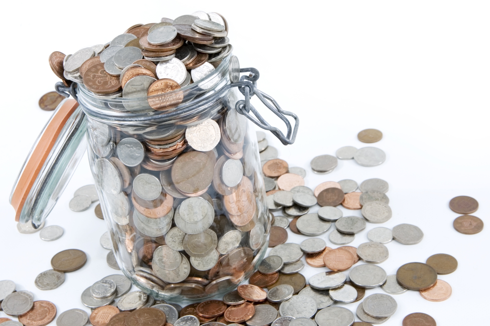 An overflowing jar of coins