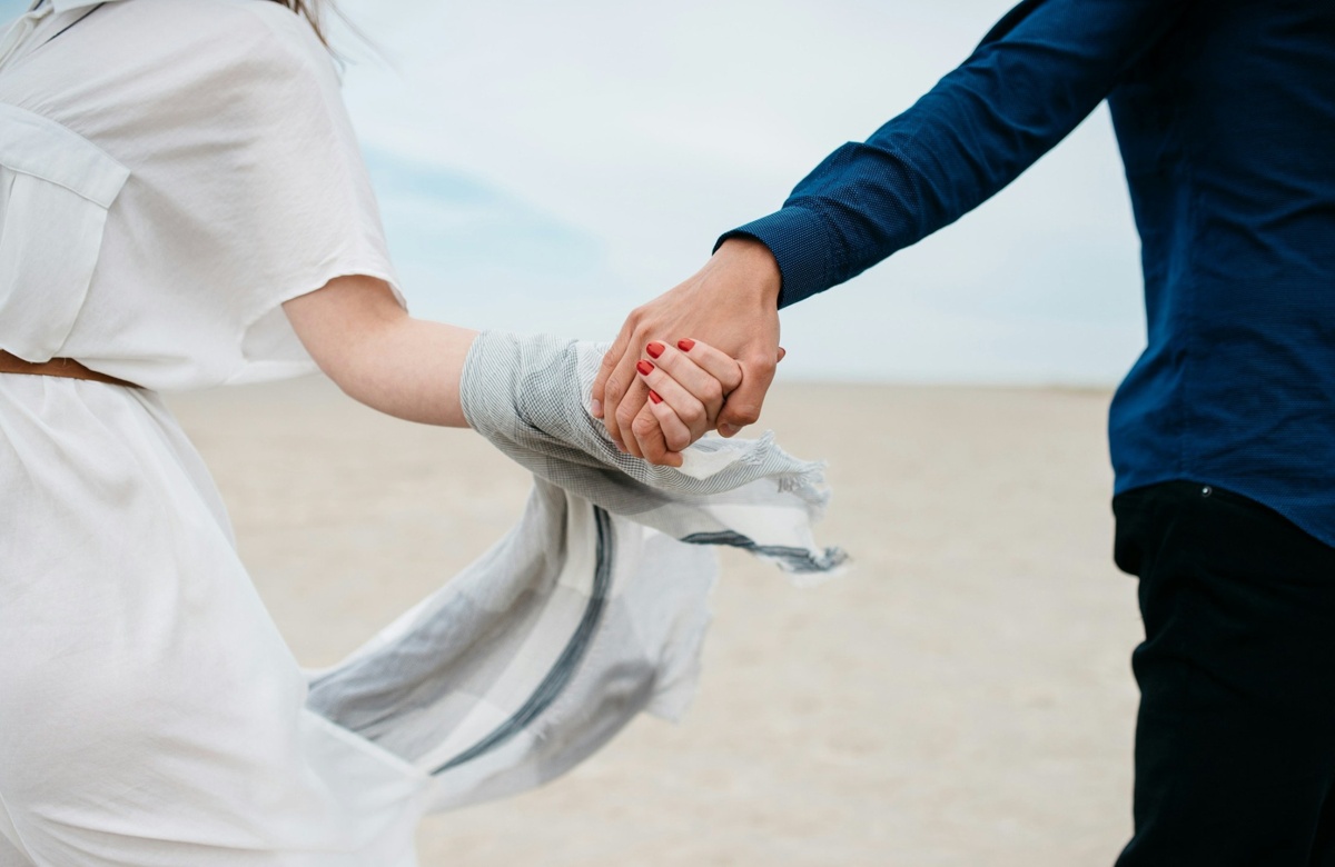 A couple holding hands